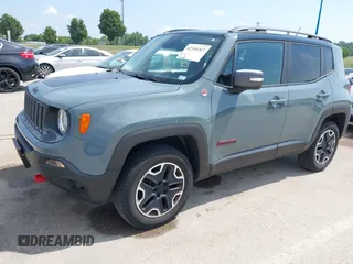2015 Jeep Renegade Trailhawk with VIN ZACCJBCT8FPB33586, listed as a IAAI auction lot 42590207 with 127,168 mi miles and . Bid and sale history available at DreamBid. Image 2.