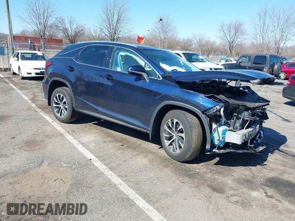 2022 Lexus RX with VIN 2T2HZMDA4NC358746, listed as a IAAI auction lot 41772090 with 26,370 mi miles. Bid and sale history available at carsss.com. Image 1.
