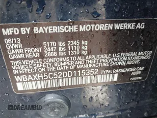 2013 BMW 5 Series 528i xDrive with VIN WBAXH5C52DD115352, listed as a IAAI auction lot 42501265 with 122,421 mi miles and . Bid and sale history available at DreamBid. Image 9.