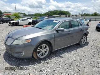 2012 Lincoln MKS with VIN 1LNHL9DR2CG804010, listed as a Copart auction lot 58702195 with 73,322 mi miles and Salvage title. Bid and sale history available at DreamBid. Image 1.