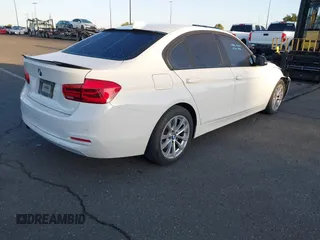 2018 BMW 3 Series 320i with VIN WBA8E1G54JNU90990, listed as a IAAI auction lot 41801197 with 140,603 mi miles. Bid and sale history available at carsss.com. Image 4.