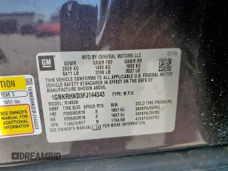 2015 Chevrolet Traverse LT z VIN 1GNKRHKD3FJ144343, wystawiony jako Copart lot #57354265 z przebiegiem 46 761 mil mil oraz Szkoda całkowita • Salvage title. Historia ofert i sprzedaży dostępna na DreamBid. Obrazek 13.