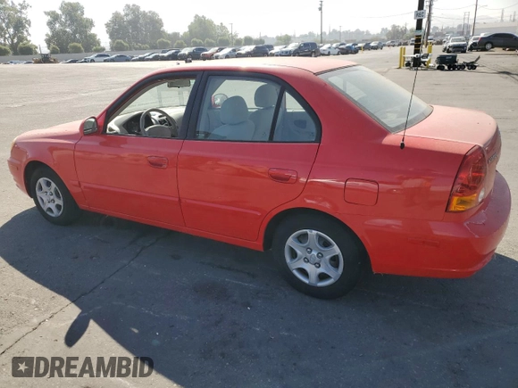 2005 Hyundai Accent GLS with VIN KMHCG45C55U593854, listed as a Copart auction lot 72237914 with 83,203 mi miles and Clean Title. Bid and sale history available at carsss.com. Image 2.
