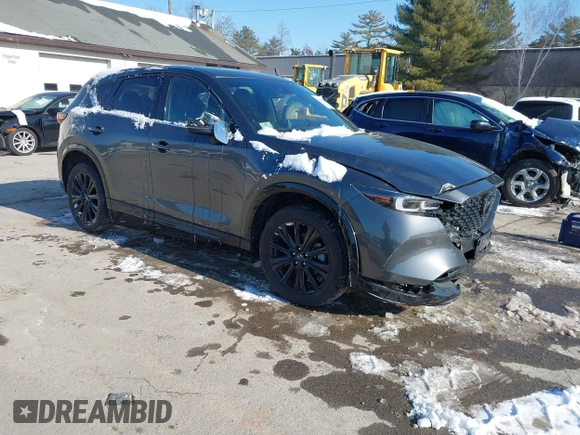 2022 Mazda CX-5 2.5 Turbo with VIN JM3KFBAY1N0526661, listed as a IAAI auction lot 41350659 with 22,963 mi miles and . Bid and sale history available at carsss.com. Image 1.