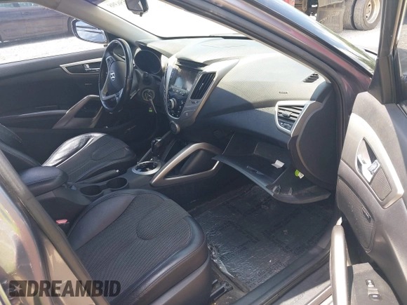 2012 Hyundai Veloster w/Black Int with VIN KMHTC6ADXCU061325, listed as a IAAI auction lot 42556398 with 122,954 mi miles and . Bid and sale history available at DreamBid. Image 5.