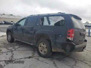 2011 Chevrolet Suburban LT with VIN 1GNSKJE38BR240348, listed as a Copart auction lot 54163335 with 263,030 mi miles and Salvage Title. Bid and sale history available at carsss.com. Image 2.