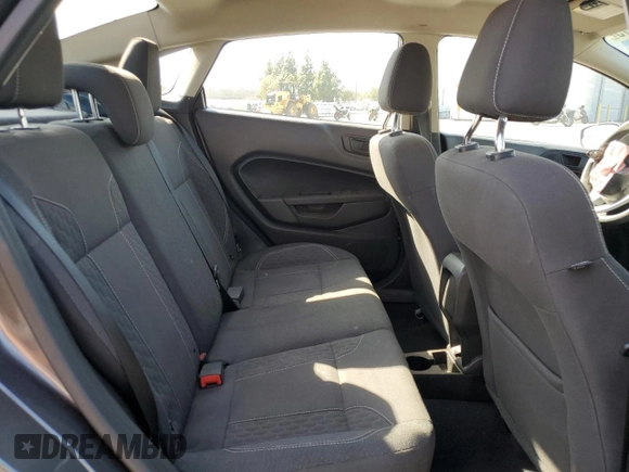 2019 Ford Fiesta SE z VIN 3FADP4BJ4KM106189, wystawiony jako Copart lot #57913315 z przebiegiem Nie podano mil oraz Szkoda całkowita • Salvage title. Historia ofert i sprzedaży dostępna na DreamBid. Obrazek 10.