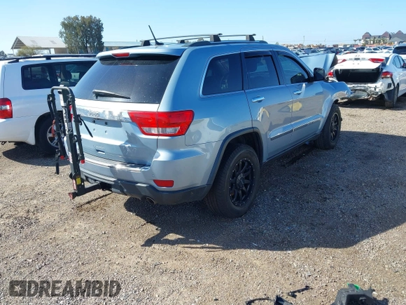 2012 Jeep Grand Cherokee Limited z VIN 1C4RJFBTXCC341813, wystawiony jako IAAI lot #41791662 z przebiegiem 120 811 mil mil oraz . Historia ofert i sprzedaży dostępna na DreamBid. Obrazek 4.