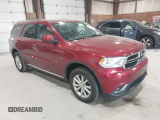 2014 Dodge Durango SXT with VIN 1C4RDJAG7EC599157, listed as a IAAI auction lot 42149340 with 180,554 mi miles and . Bid and sale history available at DreamBid. Image 1.