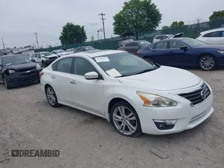 2013 Nissan Altima SL z VIN 1N4BL3AP6DC146927, wystawiony jako IAAI lot #42341629 z przebiegiem 142 474 mil mil oraz . Historia ofert i sprzedaży dostępna na DreamBid. Obrazek 1.