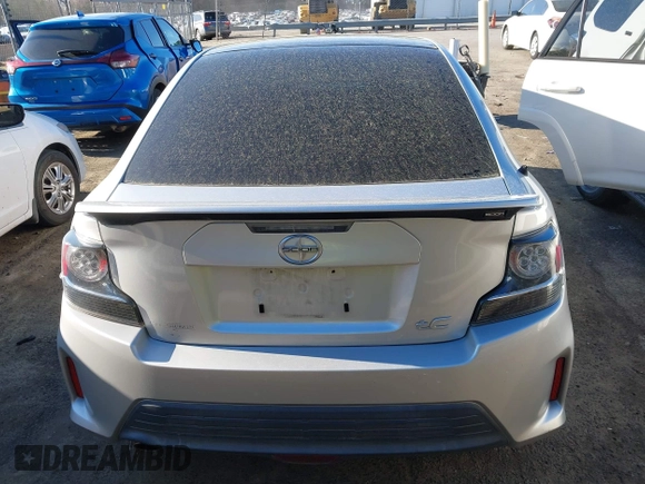 2014 Scion tC with VIN JTKJF5C74E3088669, listed as a IAAI auction lot 41891175 with 86,160 mi miles. Bid and sale history available at carsss.com. Image 16.