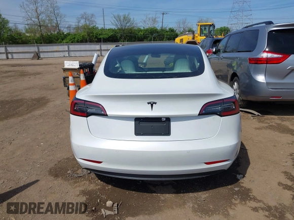 2020 Tesla Model 3 Standard Range Plus with VIN 5YJ3E1EA3LF785951, listed as a IAAI auction lot 41919339 with 63,025 mi miles and . Bid and sale history available at carsss.com. Image 15.