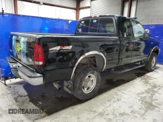 1999 Ford F-250 XL with VIN 1FTNX21SXXEE02893, listed as a Copart auction lot 75717534 with 127,574 mi miles and Clean title. Bid and sale history available at DreamBid. Image 3.
