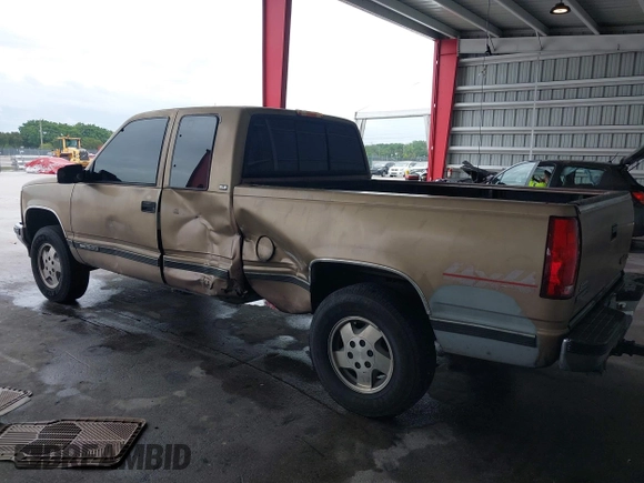 1995 GMC Sierra 1500 z VIN 2GTEK19K1S1535176, wystawiony jako IAAI lot #42243366 z przebiegiem 220 755 mil mil oraz . Historia ofert i sprzedaży dostępna na DreamBid. Obrazek 3.