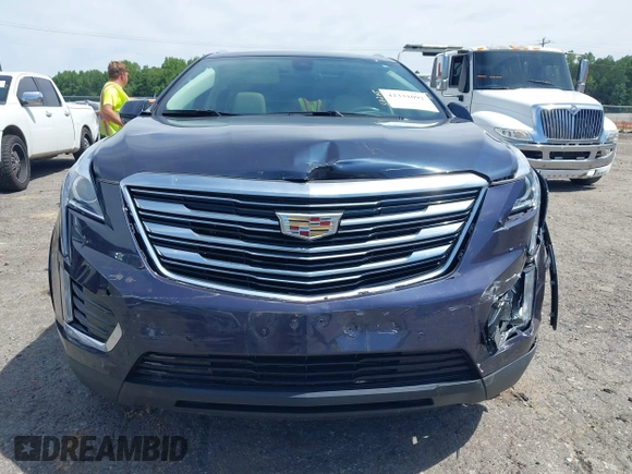 2019 Cadillac XT5 Luxury AWD z VIN 1GYKNDRSXKZ232989, wystawiony jako IAAI lot #42331092 z przebiegiem 54 100 mil mil oraz . Historia ofert i sprzedaży dostępna na DreamBid. Obrazek 12.