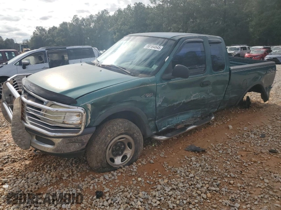 1997 Ford F-150 XL with VIN 1FTDX1869VKB05501, listed as a Copart auction lot 88164845 with 146,840 mi miles and Salvage Title. Bid and sale history available at carsss.com. Image 1.
