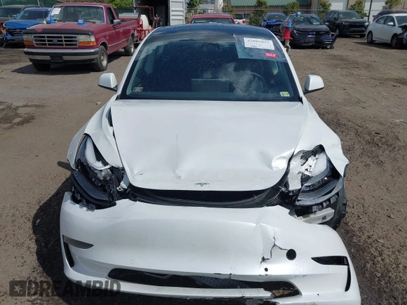 2022 Tesla Model 3 Long Range z VIN 5YJ3E1EB4NF183832, wystawiony jako IAAI lot #42085815 z przebiegiem 35 880 mil mil oraz . Historia ofert i sprzedaży dostępna na DreamBid. Obrazek 6.