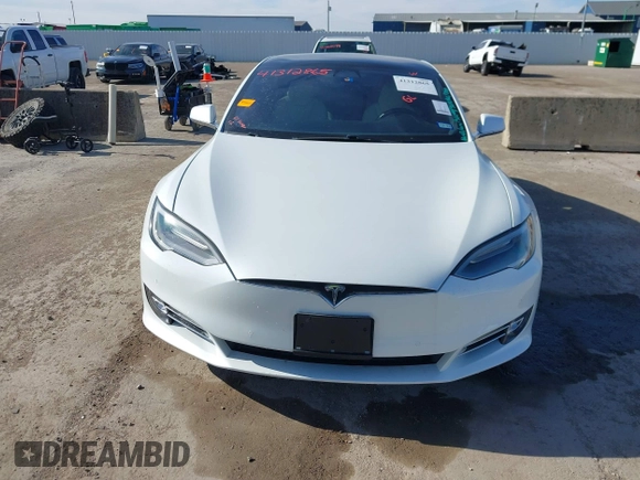 2020 Tesla Model S Long Range with VIN 5YJSA1E23LF360441, listed as a IAAI auction lot 41312865 with 68,967 mi miles and . Bid and sale history available at DreamBid. Image 12.