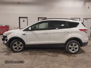 2016 Ford Escape SE with VIN 1FMCU9GX9GUC69153, listed as a IAAI auction lot 41504167 with 149,115 mi miles and . Bid and sale history available at DreamBid. Image 14.