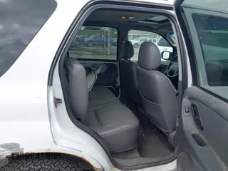 2003 Ford Escape XLT Popular 2 with VIN 1FMYU93193KC06499, listed as a IAAI auction lot 42192640 with 180,095 mi miles and . Bid and sale history available at DreamBid. Image 8.
