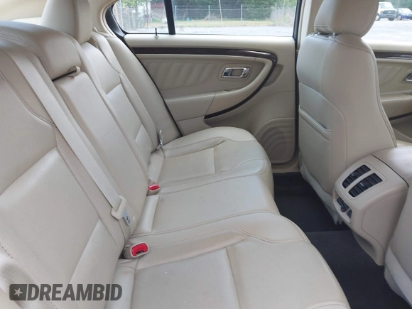 2015 Ford Taurus Limited with VIN 1FAHP2F89FG182598, listed as a IAAI auction lot 42222372 with 124,627 mi miles and . Bid and sale history available at DreamBid. Image 8.
