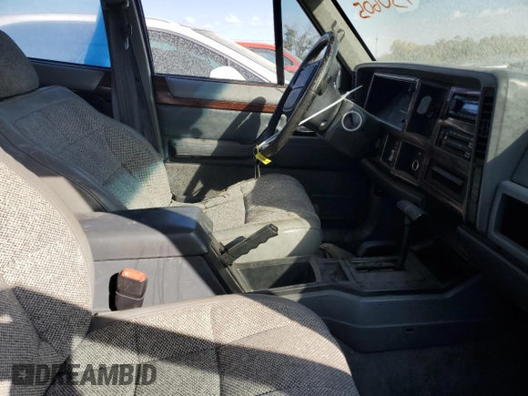 1996 Jeep Cherokee Country with VIN 1J4FJ78S9TL130605, listed as a Copart auction lot 74673934 with 196,857 mi miles and Salvage Title. Bid and sale history available at carsss.com. Image 7.