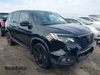 2021 Honda Passport Sport z VIN 5FNYF8H25MB038529, wystawiony jako IAAI lot #41891571 z przebiegiem 52 993 mil mil oraz . Historia ofert i sprzedaży dostępna na DreamBid. Obrazek 1.
