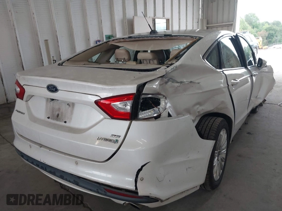 2013 Ford Fusion SE Hybrid with VIN 3FA6P0LU8DR357054, listed as a IAAI auction lot 42372168 with 143,979 mi miles and . Bid and sale history available at DreamBid. Image 4.