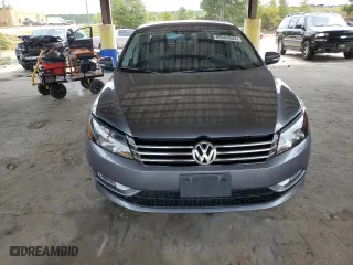 2015 Volkswagen Passat 1.8T Sport with VIN 1VWBT7A35FC009590, listed as a Copart auction lot 69564634 with 61,959 mi miles and Salvage Title. Bid and sale history available at carsss.com. Image 5.