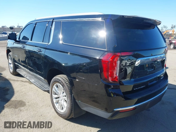 2021 GMC Yukon XL SLT with VIN 1GKS2GKD0MR471504, listed as a IAAI auction lot 41668145 with 55,917 mi miles. Bid and sale history available at carsss.com. Image 3.