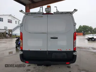2015 Ford Transit Cargo z VIN 1FTNR1ZMXFKA45161, wystawiony jako IAAI lot #42181449 z przebiegiem 130 096 mil mil oraz . Historia ofert i sprzedaży dostępna na DreamBid. Obrazek 16.