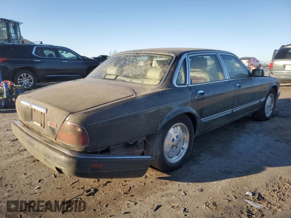 1995 Jaguar XJ with VIN SAJKX1747SC722815, listed as a Copart auction lot 83743934 with Not Provided miles and Clean Title. Bid and sale history available at DreamBid. Image 3.