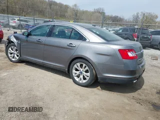 2012 Ford Taurus SEL z VIN 1FAHP2EWXCG138038, wystawiony jako IAAI lot #42007614 z przebiegiem 155 045 mil mil oraz . Historia ofert i sprzedaży dostępna na DreamBid. Obrazek 3.