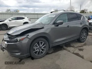 2017 Mazda CX-5 Grand Touring with VIN JM3KFBDL4H0163339, listed as a Copart auction lot 50566495 with 83,453 mi miles and Salvage Title. Bid and sale history available at carsss.com. Image 1.