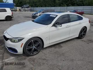 2018 BMW 4 Series 430i with VIN WBA4J1C51JBG77009, listed as a Copart auction lot 66843395 with 98,788 mi miles and Salvage title. Bid and sale history available at DreamBid. Image 1.