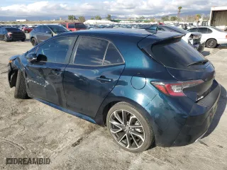 2021 Toyota Corolla Hatchback XSE with VIN JTNC4MBEXM3137464, listed as a Copart auction lot 44084395 with 39,569 mi miles and Salvage Title. Bid and sale history available at carsss.com. Image 2.