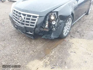2014 Cadillac CTS Coupe with VIN 1G6DA1E38E0192205, listed as a IAAI auction lot 41732523 with 153,424 mi miles. Bid and sale history available at carsss.com. Image 6.