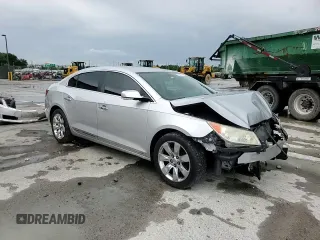 2013 Buick LaCrosse Premium 1 z VIN 1G4GF5E33DF170154, wystawiony jako Copart lot #59536615 z przebiegiem 213 717 mil mil oraz Szkoda całkowita • Salvage title. Historia ofert i sprzedaży dostępna na DreamBid. Obrazek 14.