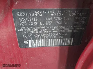 2012 Hyundai Elantra GLS with VIN KMHDH4AE3CU477283, listed as a IAAI auction lot 41701491 with 210,614 mi miles. Bid and sale history available at carsss.com. Image 9.