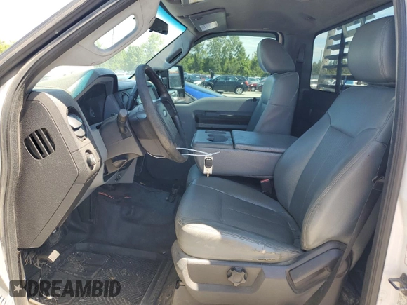 2013 Ford F-250 XL with VIN 1FTBF2A65DEA63805, listed as a Copart auction lot 63109464 with 199,691 mi miles and Salvage Title. Bid and sale history available at DreamBid. Image 7.