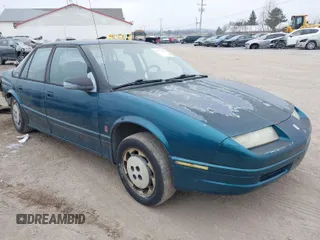 1992 Saturn SL z VIN 1G8ZK5479NZ255474, wystawiony jako IAAI lot #41779481 z przebiegiem 181 797 mil mil oraz . Historia ofert i sprzedaży dostępna na DreamBid. Obrazek 1.