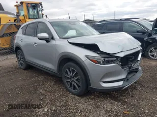 2017 Mazda CX-5 Grand Touring with VIN JM3KFBDL8H0203101, listed as a IAAI auction lot 41305484 with 151,816 mi miles. Bid and sale history available at carsss.com. Image 1.