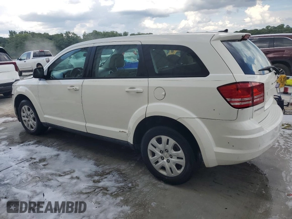 2014 Dodge Journey American Value with VIN 3C4PDCAB3ET216889, listed as a Copart auction lot 60874265 with 117,508 mi miles and Salvage title. Bid and sale history available at DreamBid. Image 2.