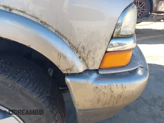 2002 Chevrolet Blazer LS z VIN 1GNDT13W52K213071, wystawiony jako IAAI lot #41336010 z przebiegiem 157 758 mil mil oraz . Historia ofert i sprzedaży dostępna na DreamBid. Obrazek 6.