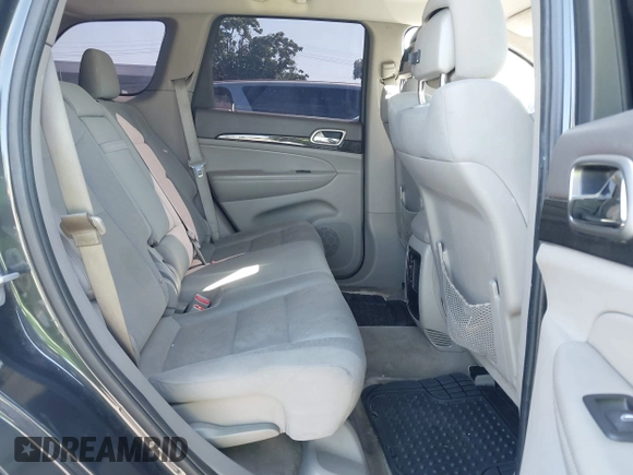 2011 Jeep Grand Cherokee Laredo z VIN 1J4RR4GG6BC562133, wystawiony jako IAAI lot #42330831 z przebiegiem 168 657 mil mil oraz . Historia ofert i sprzedaży dostępna na DreamBid. Obrazek 8.