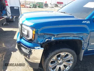 2018 GMC Sierra 1500 SLT z VIN 3GTU2NEC8JG254323, wystawiony jako IAAI lot #41772180 z przebiegiem 157 143 mil mil oraz . Historia ofert i sprzedaży dostępna na DreamBid. Obrazek 6.