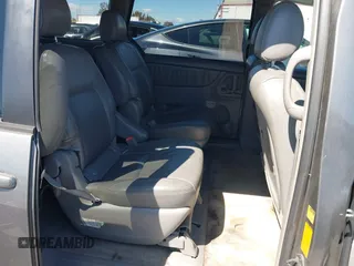 2005 Toyota Sienna XLE with VIN 5TDZA22C65S299604, listed as a IAAI auction lot 41949186 with 205,243 mi miles and . Bid and sale history available at carsss.com. Image 8.