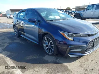 2021 Toyota Corolla SE with VIN 5YFP4MCE5MP082661, listed as a IAAI auction lot 41573579 with 58,418 mi miles. Bid and sale history available at carsss.com. Image 1.