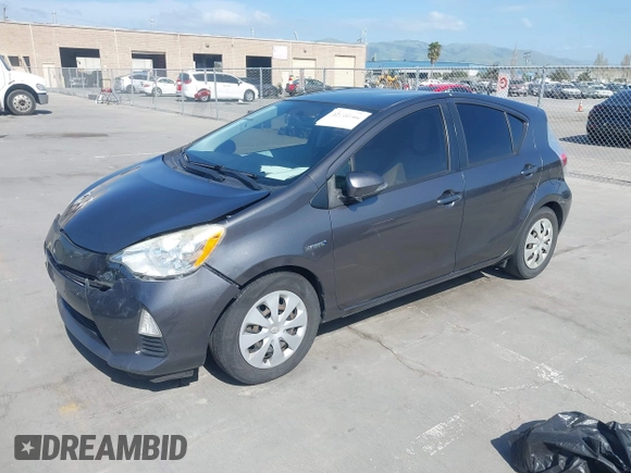 2014 Toyota Prius One with VIN JTDKDTB33E1061088, listed as a IAAI auction lot 42040762 with 206,735 mi miles and . Bid and sale history available at DreamBid. Image 2.