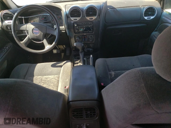 2005 GMC Envoy SLE с VIN 1GKDS13S852264341, выставлен на аукционе Copart как лот 49835015 с пробегом 178 401 миль миль и Списание • Salvage title. История ставок и продаж доступна на DreamBid. Изображение 8.
